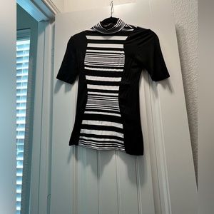 Mock neck cap sleeve tank.